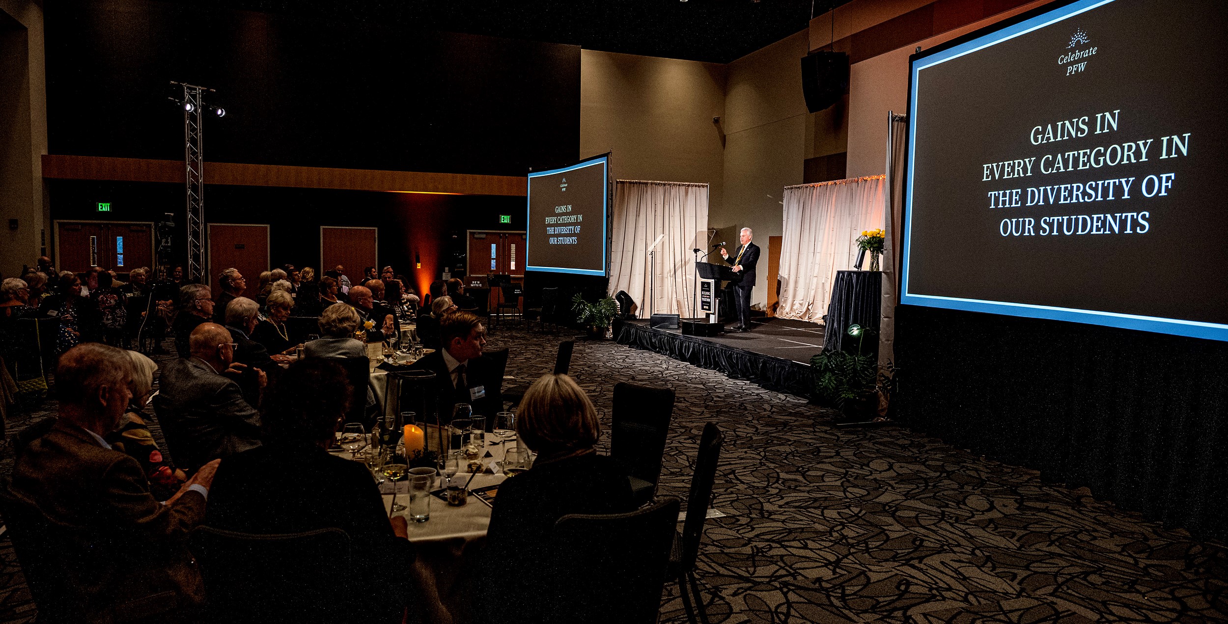 A crowd listens intently to a speaker during a Celebrate Philanthropy event.