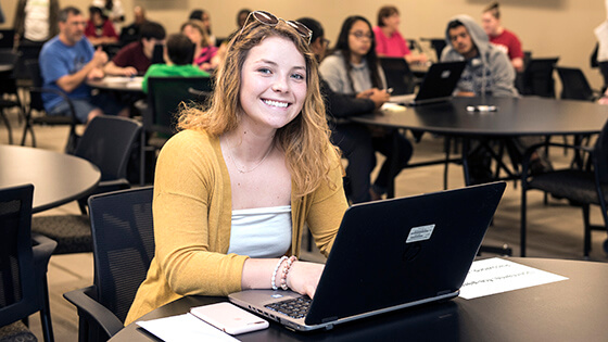 A student prepares information for her Free Application for Federal Student Aid, also known as the FAFSA.