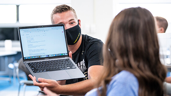 A student receives tutoring help.