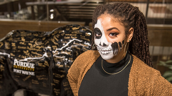 A student painted her face in celebration of Dia de los Muertos.