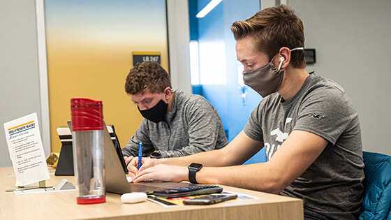 Students study in the Helmke Library.