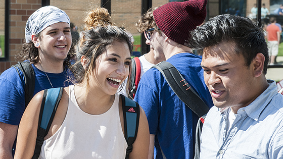 Student laughing at welcome back week event