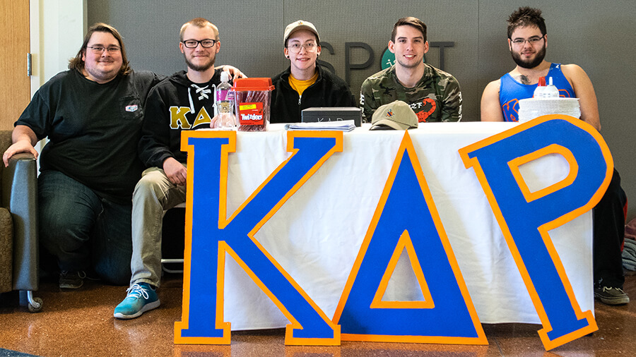 Honorary organization members recruiting members in Walb Student Union