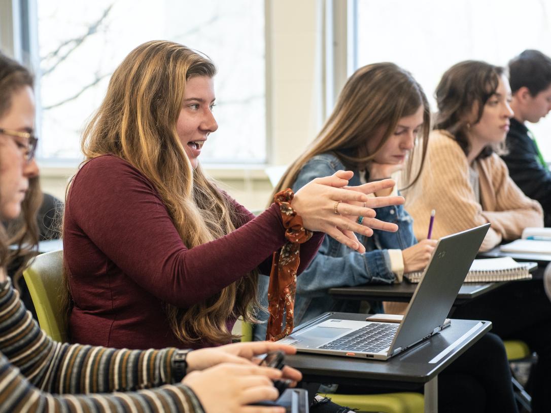 Student discusses a topic in ethics class.