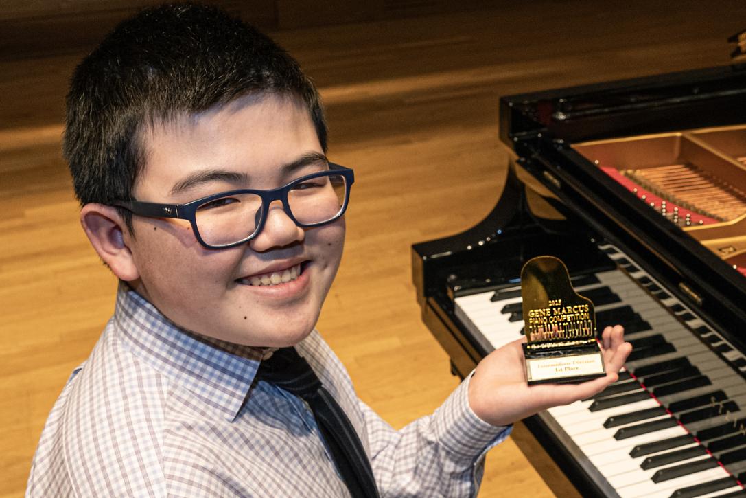Gene-Marcus-Piano-Prize-Winner-with-Trophy