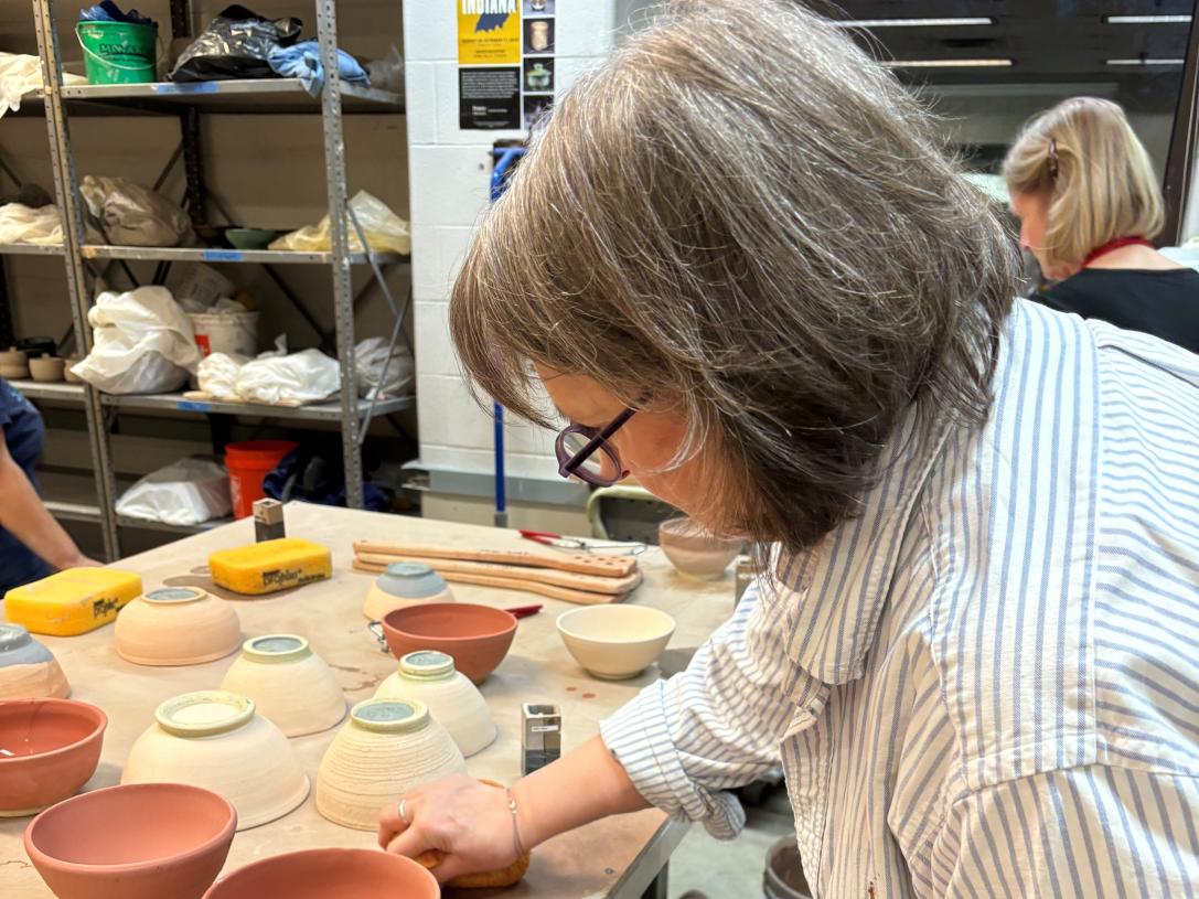 women doing pottery