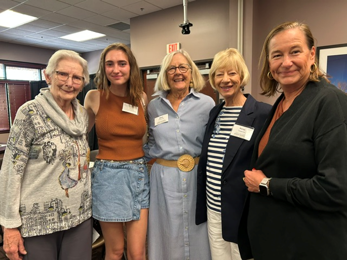 5 women smiling
