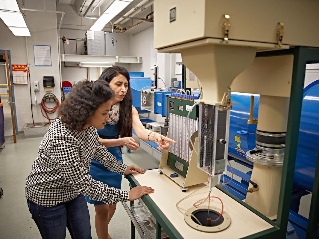 Student and professor in a lab