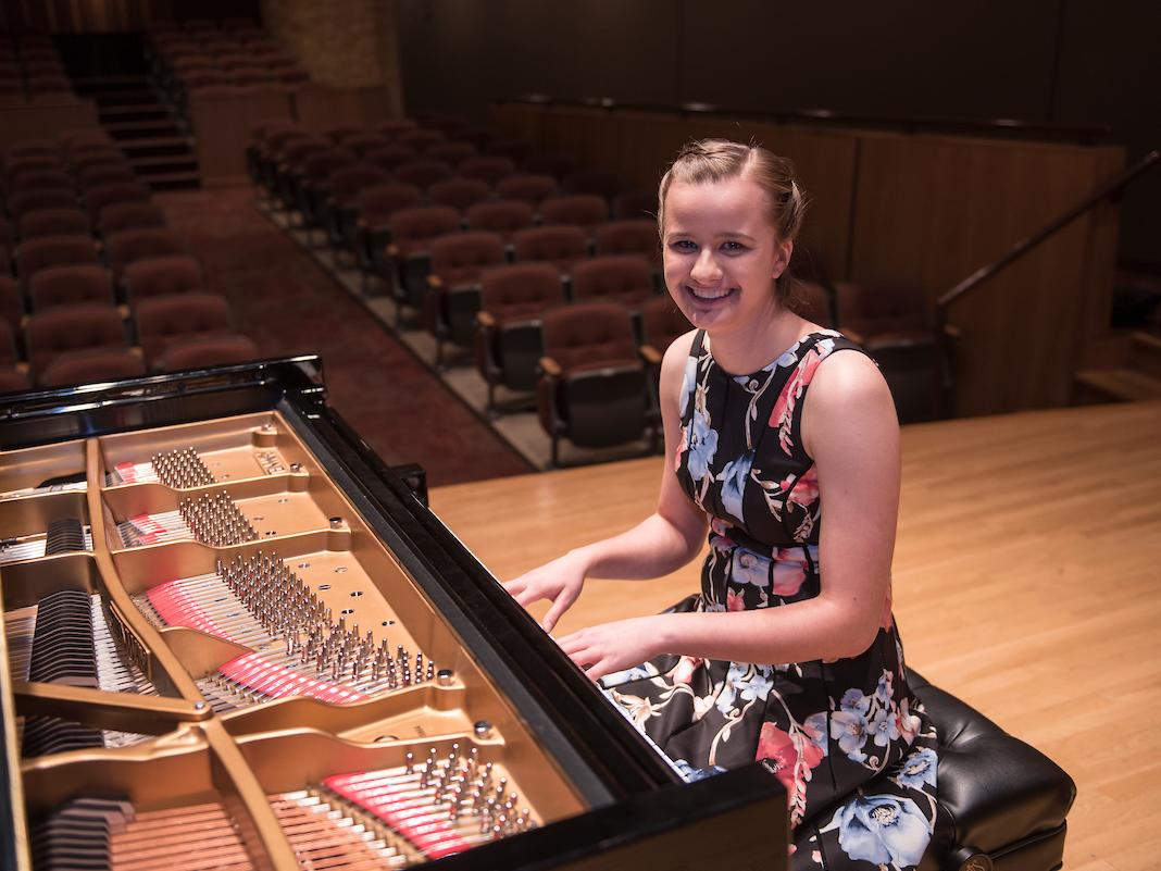 Student playing piano