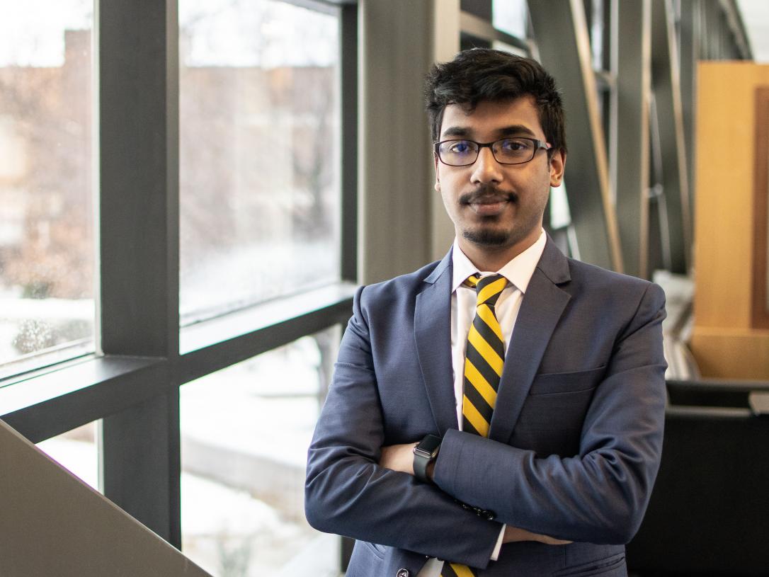 Male business student posing indoors.