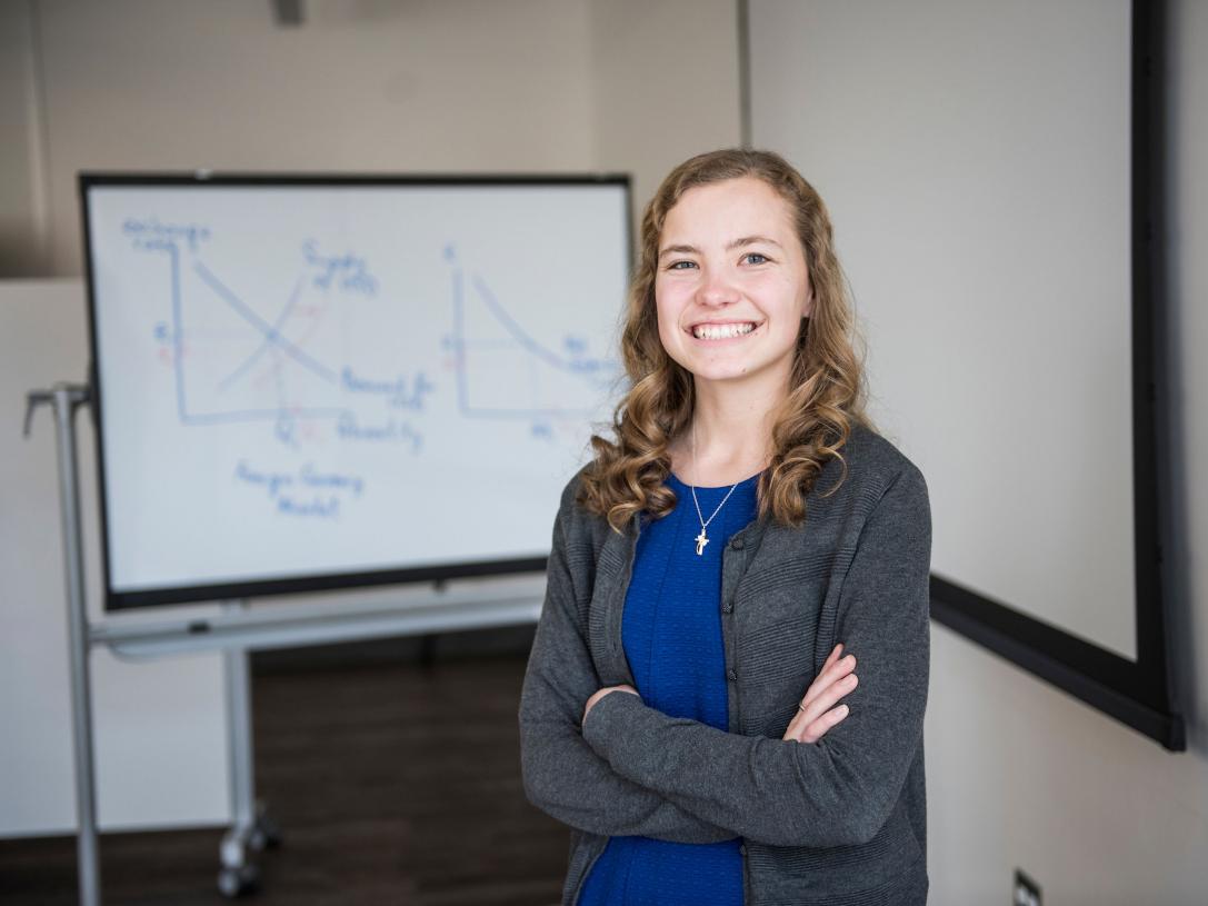 Female business student posing indoors.