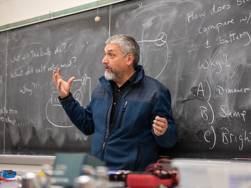 Professor at chalkboard