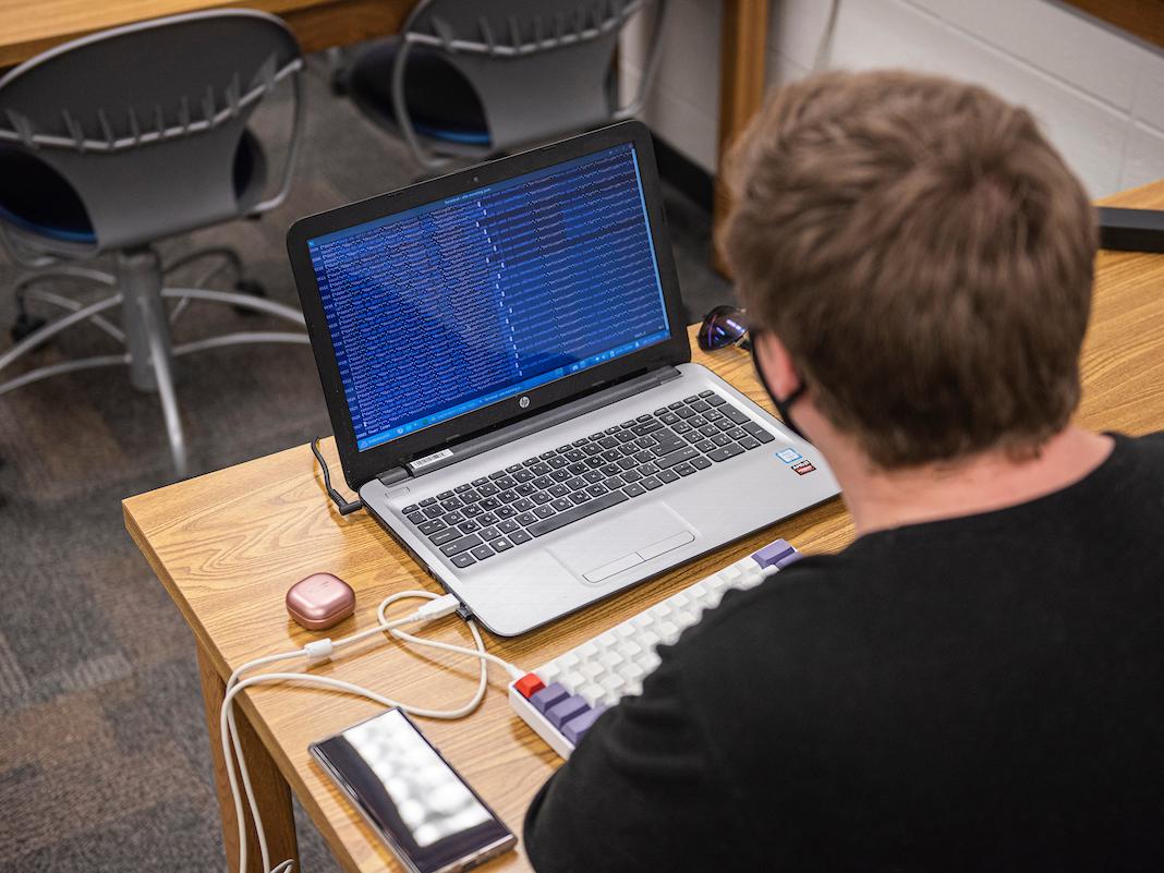 Student with computer