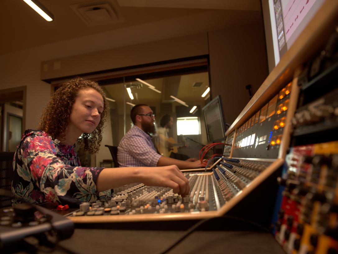 A student works on music tech.