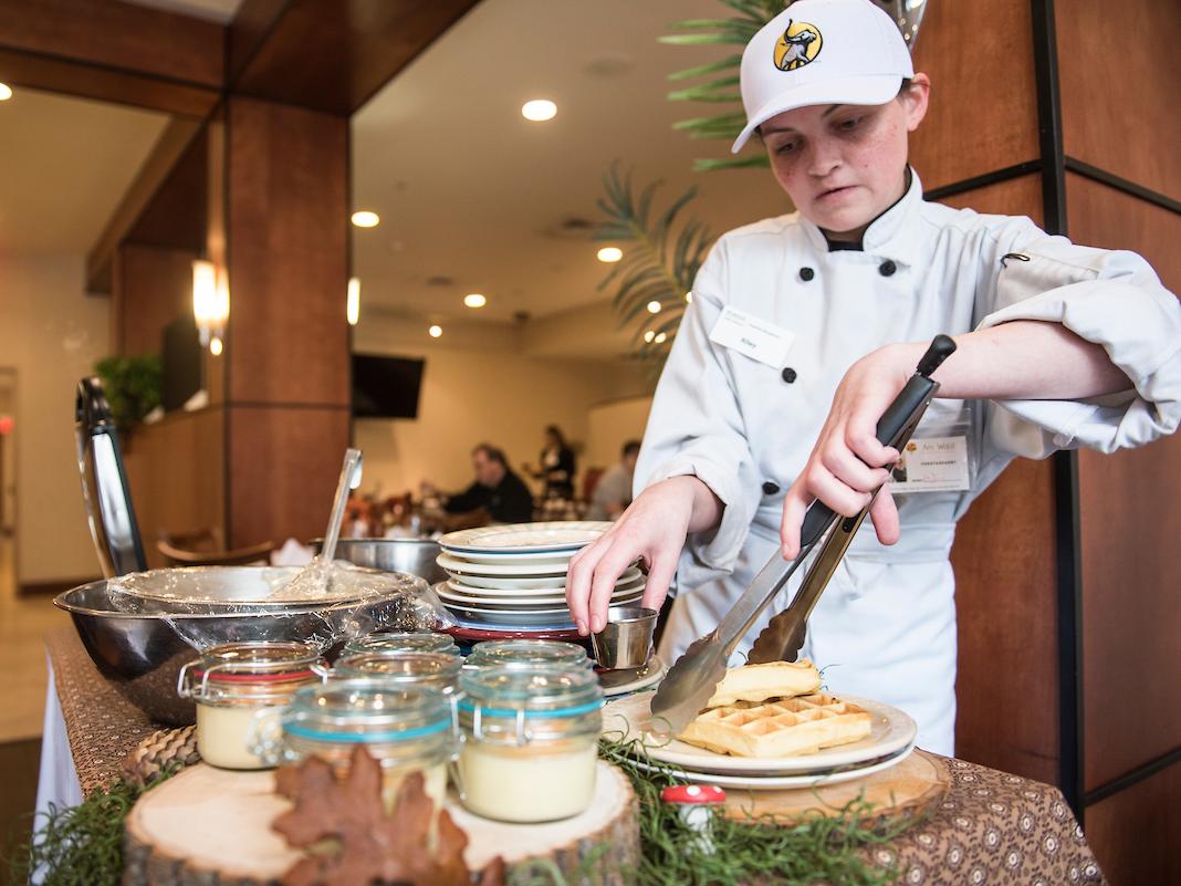 Student working at event