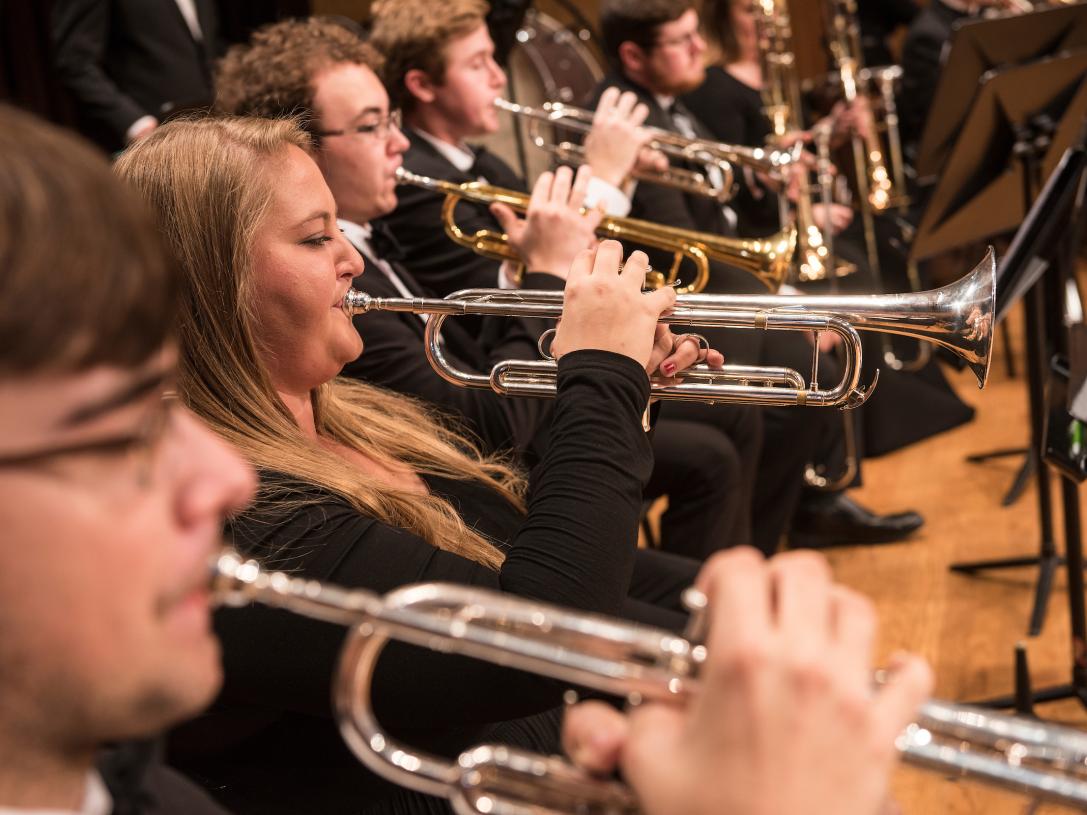 Students performing in an orchestra