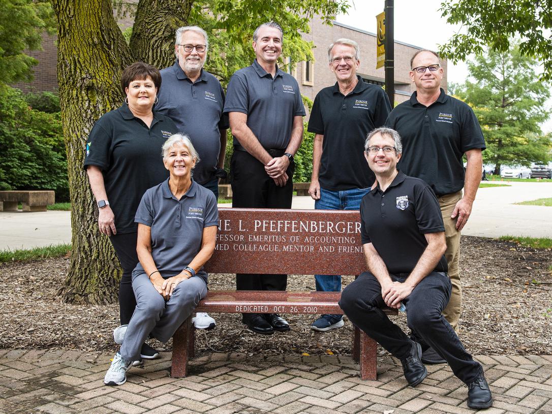 A group shot outdoors of the Accounting department staff