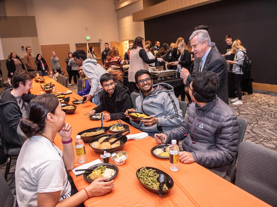 PFW Chancellor Ron Elsenbaumer interacts with students during ThanksStudentsGiving in 2019