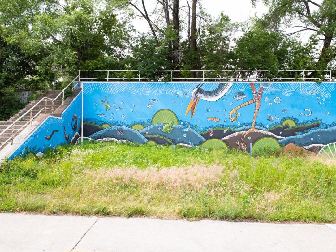 Jeremy Stroup's 'Heron' mural on a railroad underpass.