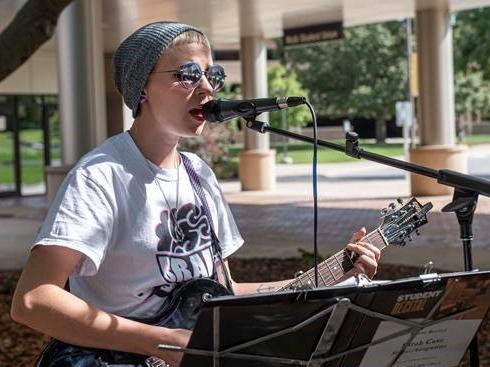 Gold Top Music Group recording artist Bear Case performs on the Alumni Plaza.