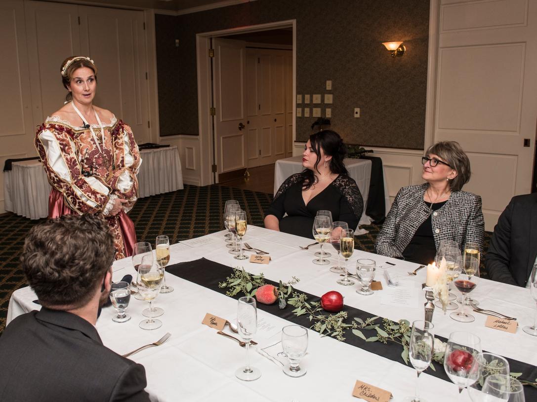 People dining at a long table