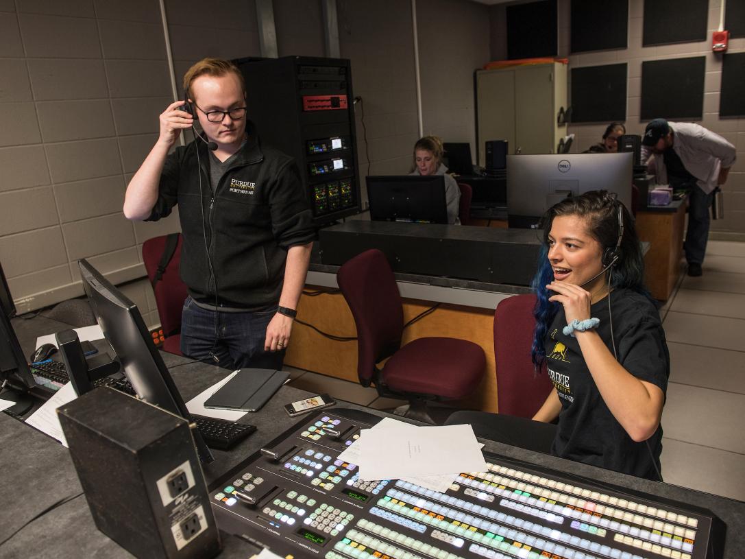 Students in a broadcasting studio