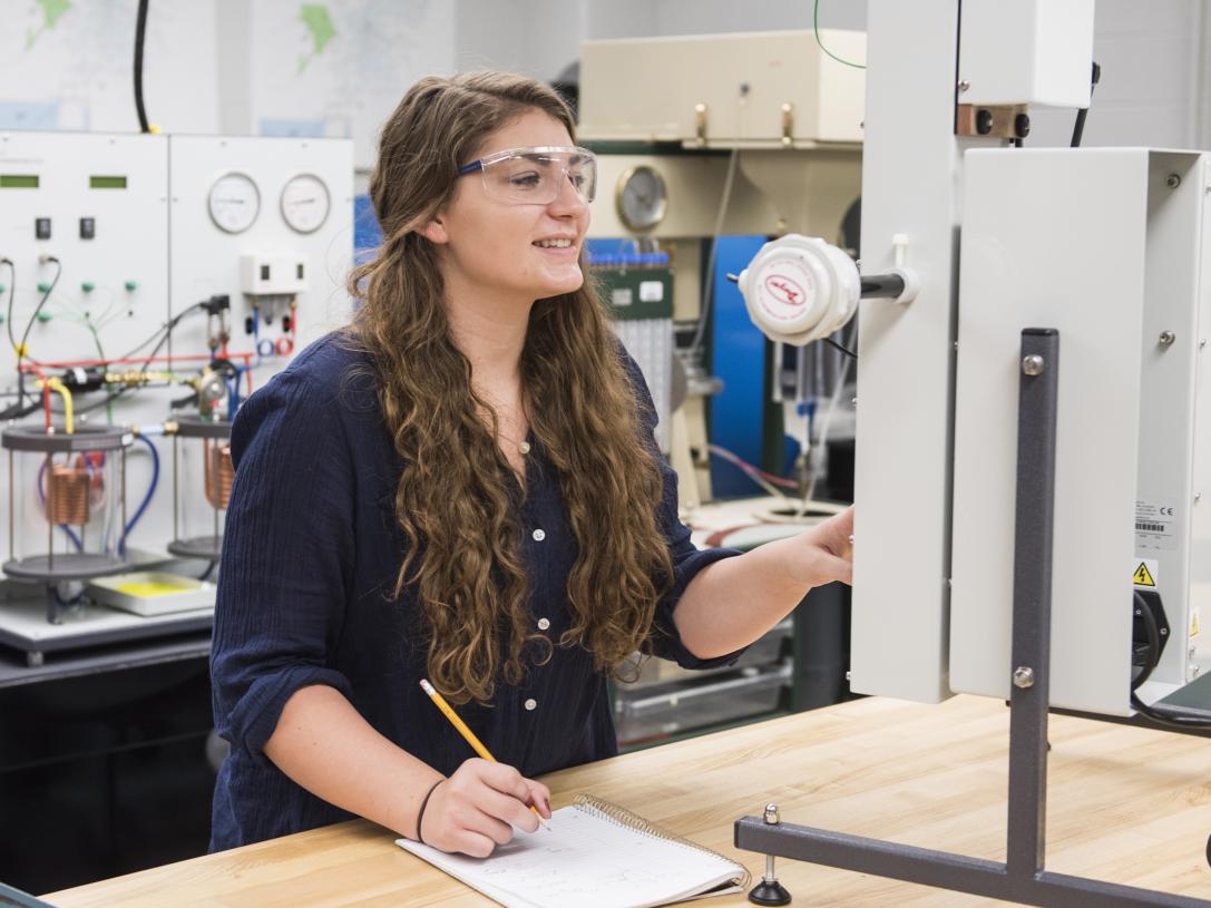 An ETCS student doing research in a lab