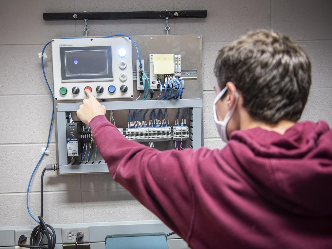 Student working in ECE lab.