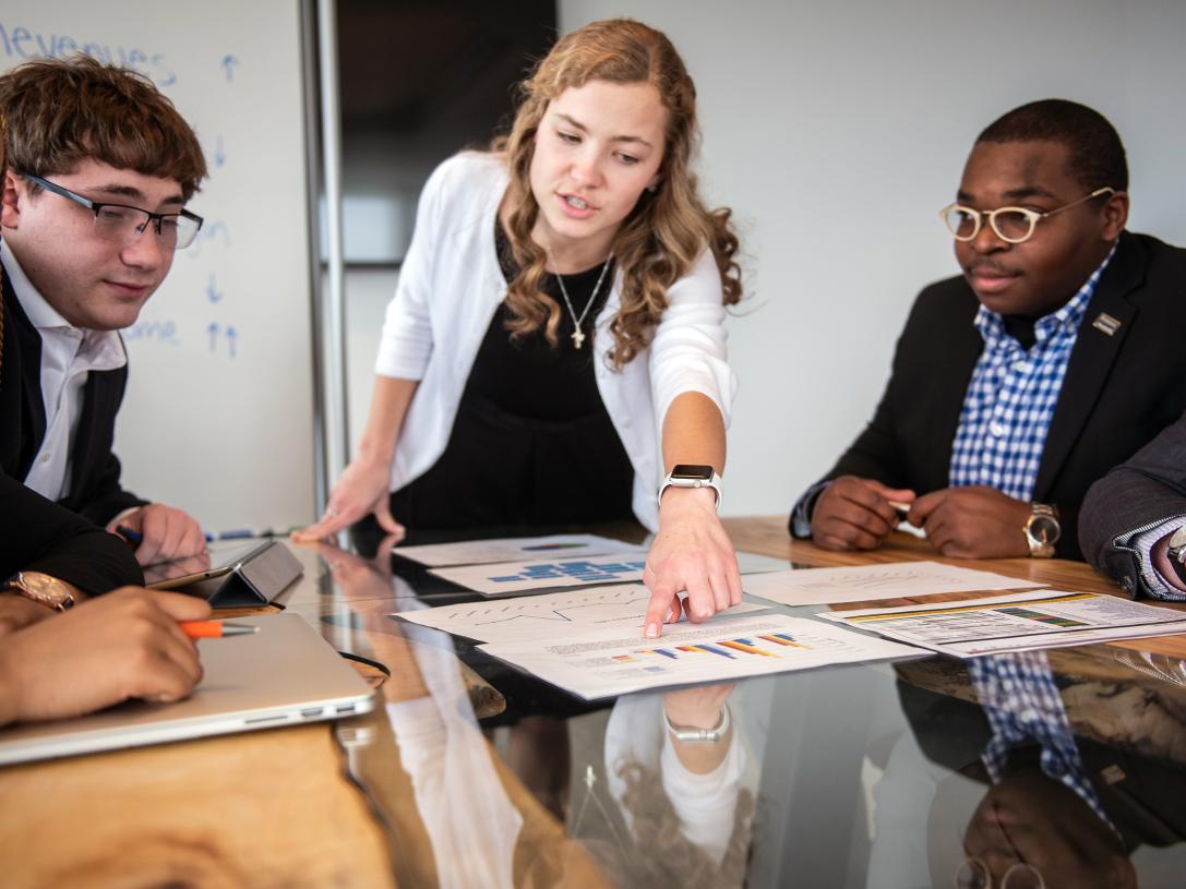 Students at a business meeting