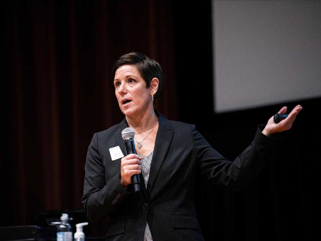 Stacey Hartman speaks at a criminal justice symposium event on campus.