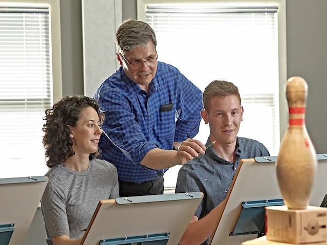 Hrehov assists Purdue Fort Wayne students in a drawing studio