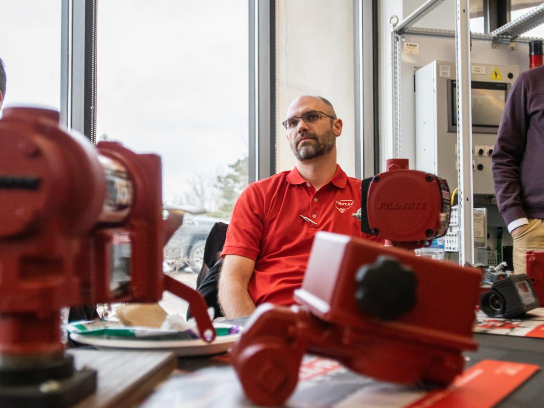 Engineer sitting with equipment