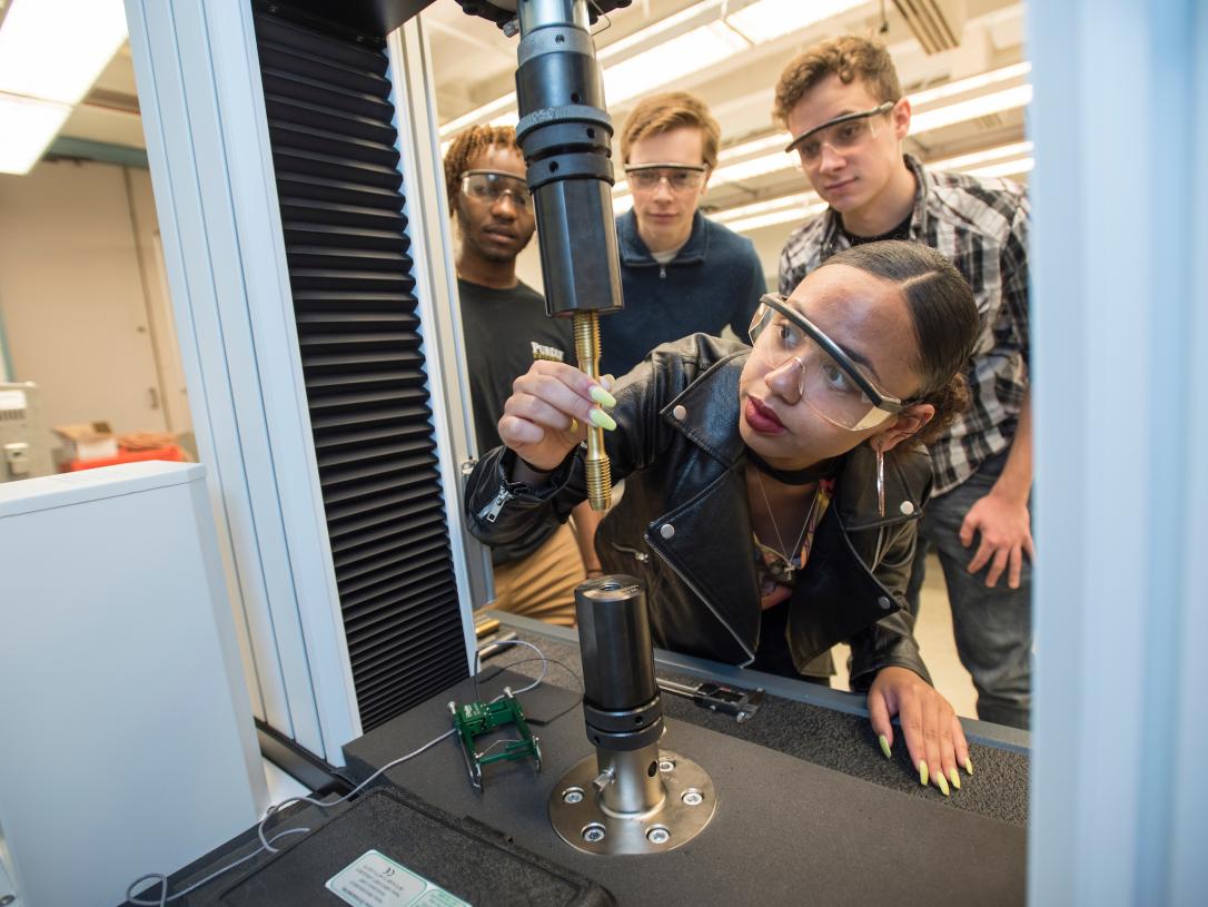 Students using equipment