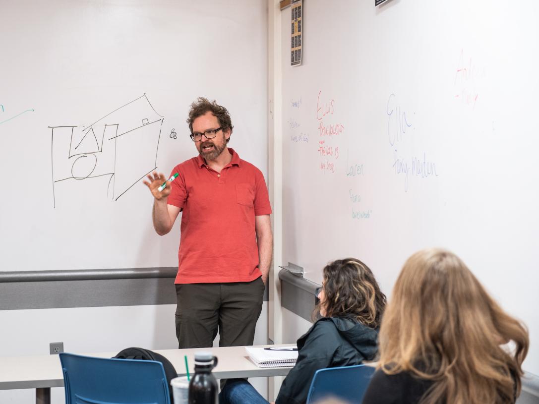 Fleming teaching an English class.