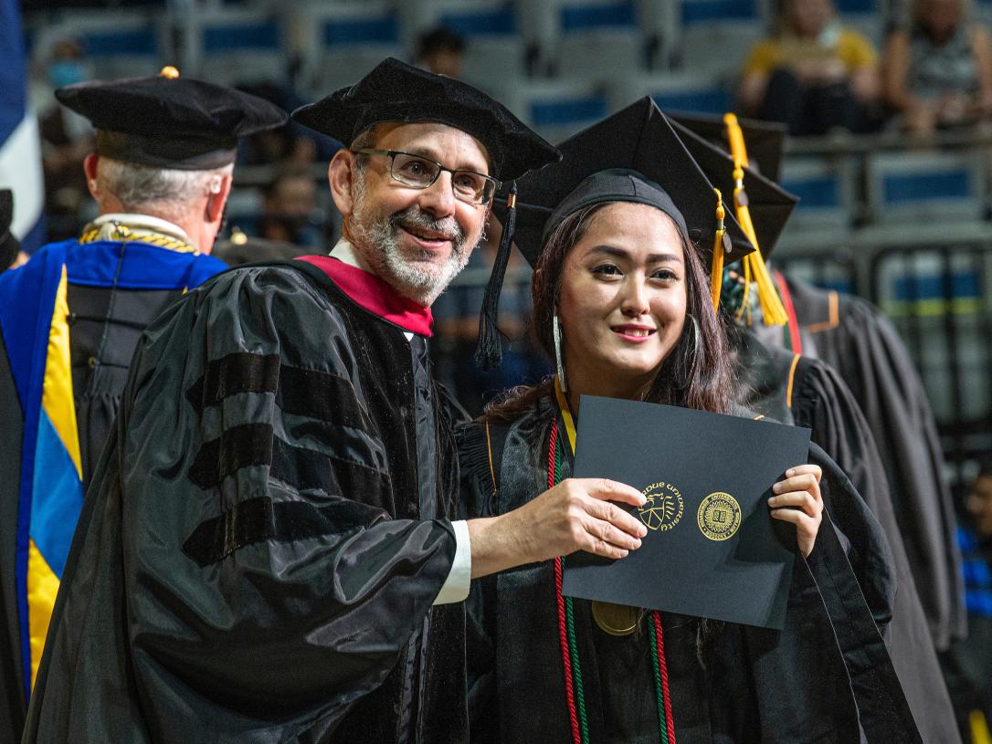 Student receiving diploma