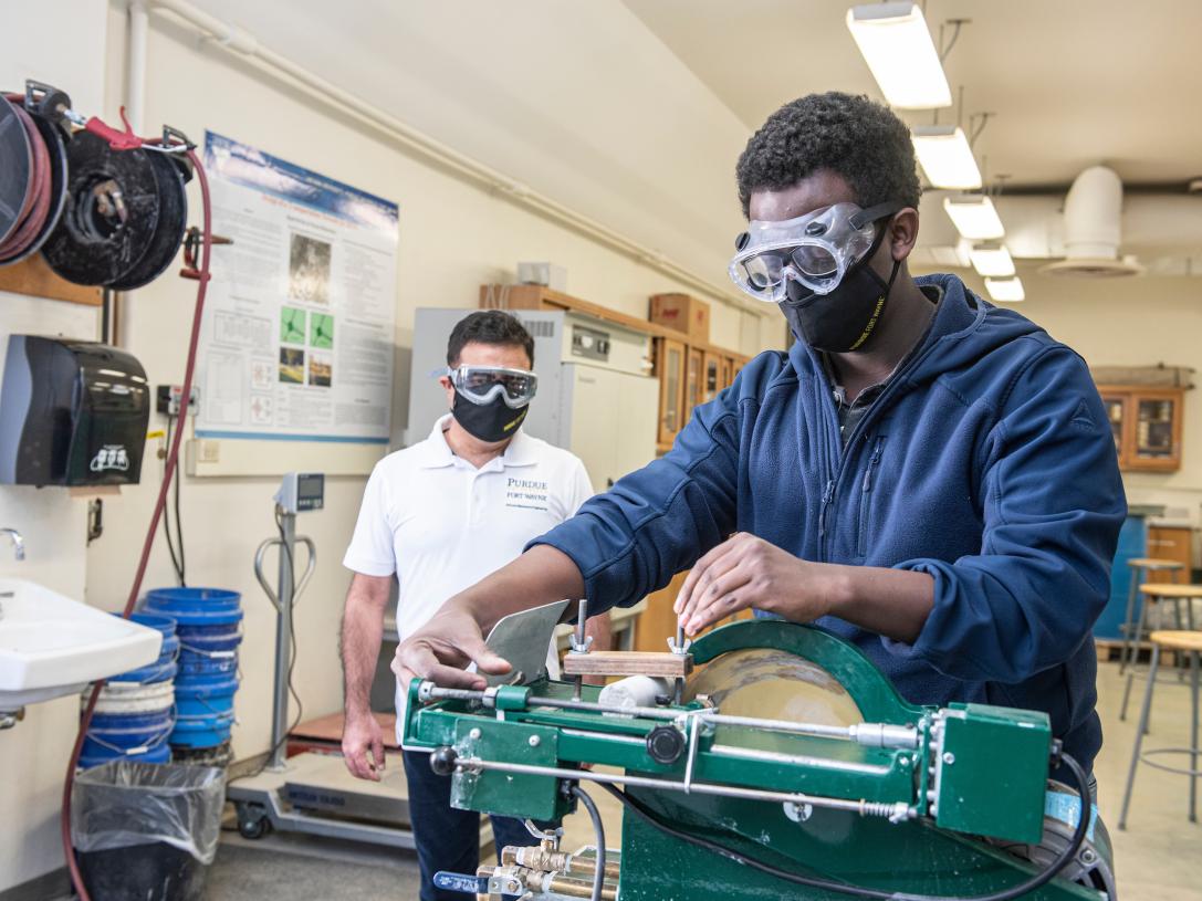 Student using equipment