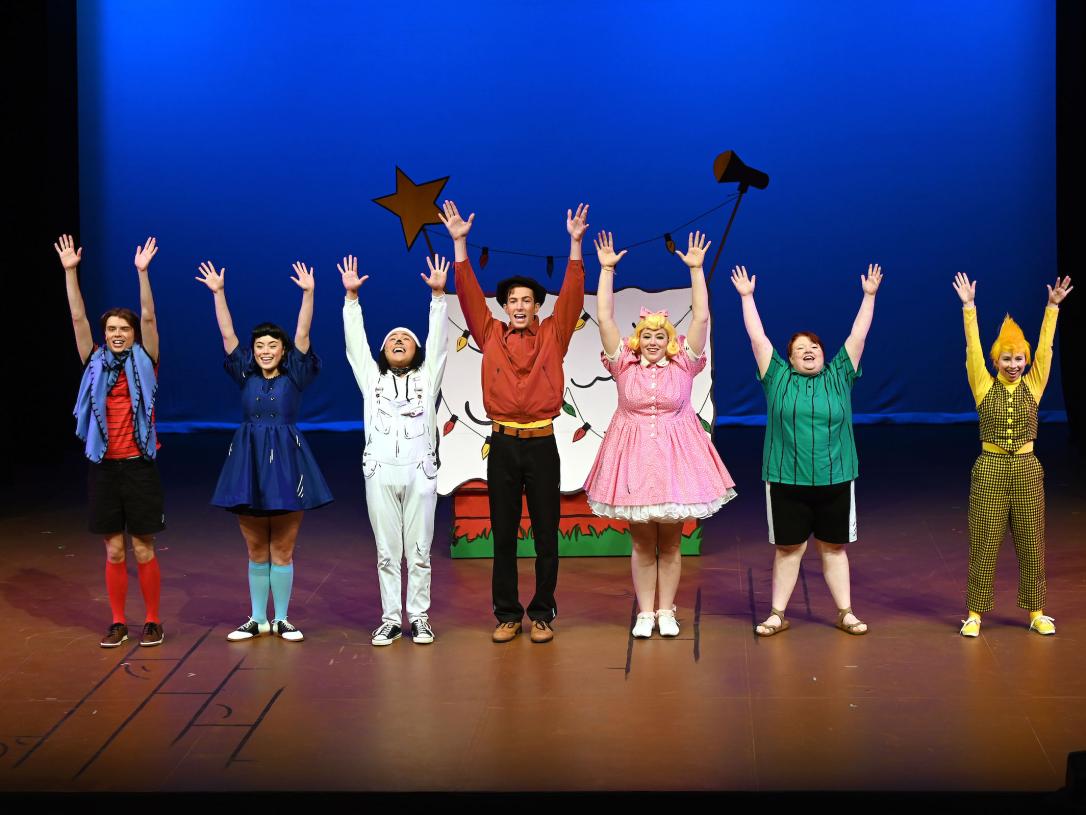 The cast of the musical The World According to Snoopy