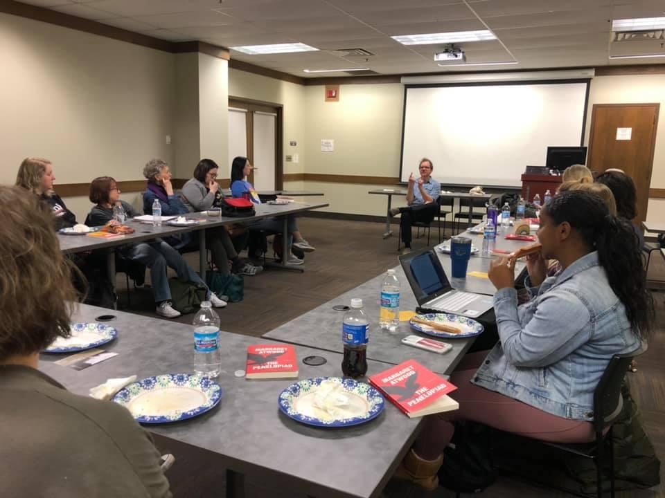 Students at a book discussion