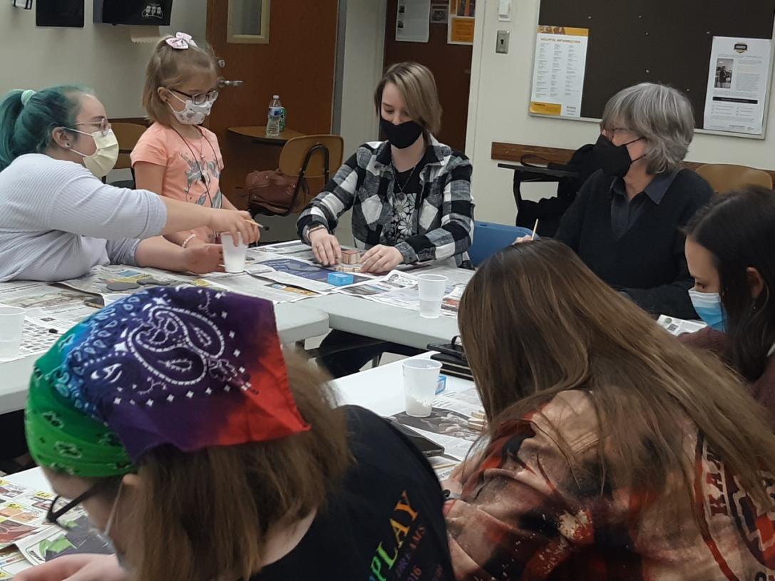 Students making ornaments