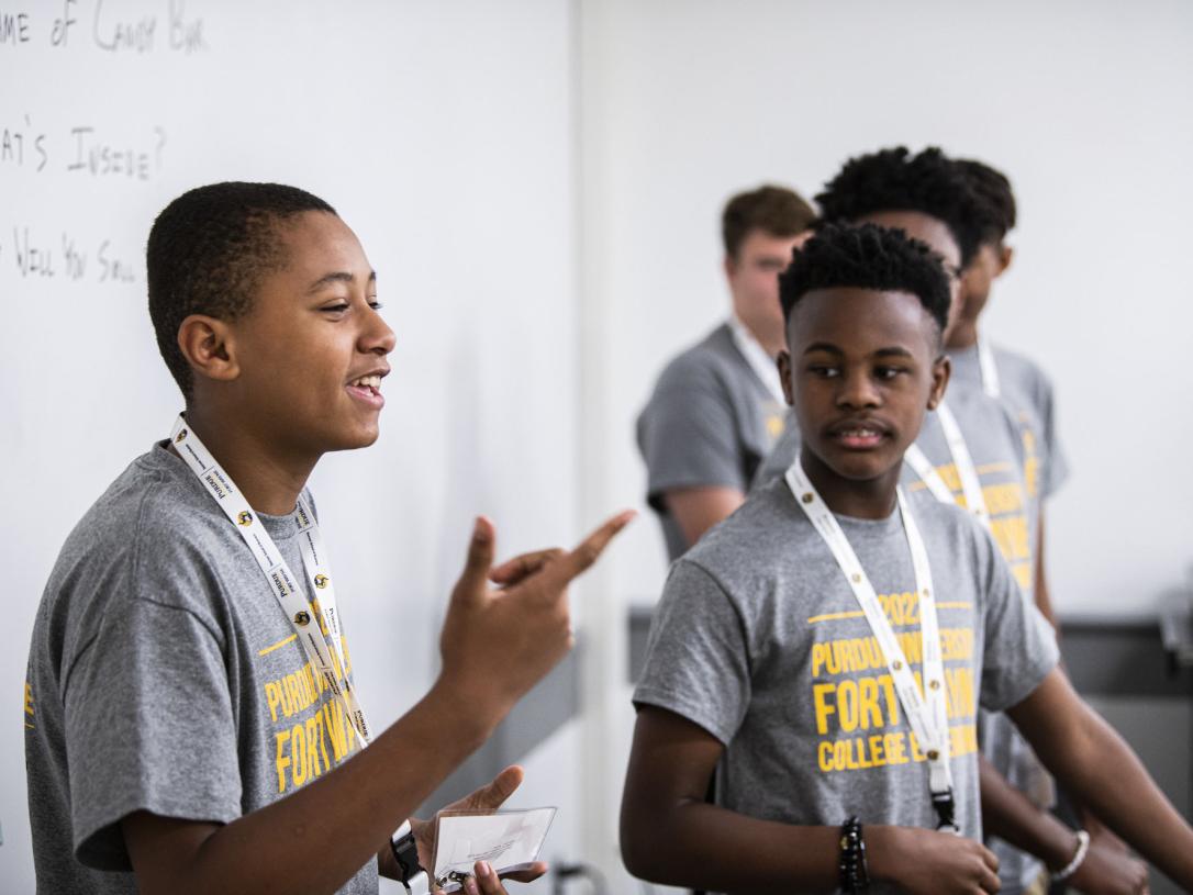 Students in a classroom at the College Experience