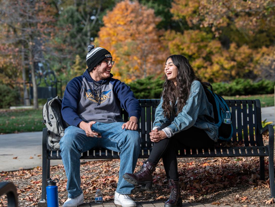 Students sitting on a bench