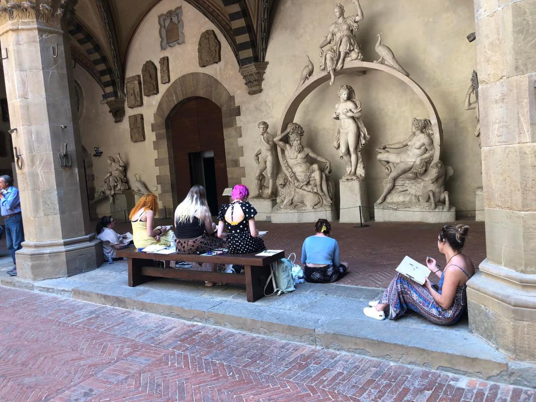 Art students sketching statues in Florence