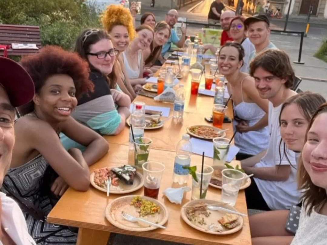 Students eating dinner outside in Florence, Italy