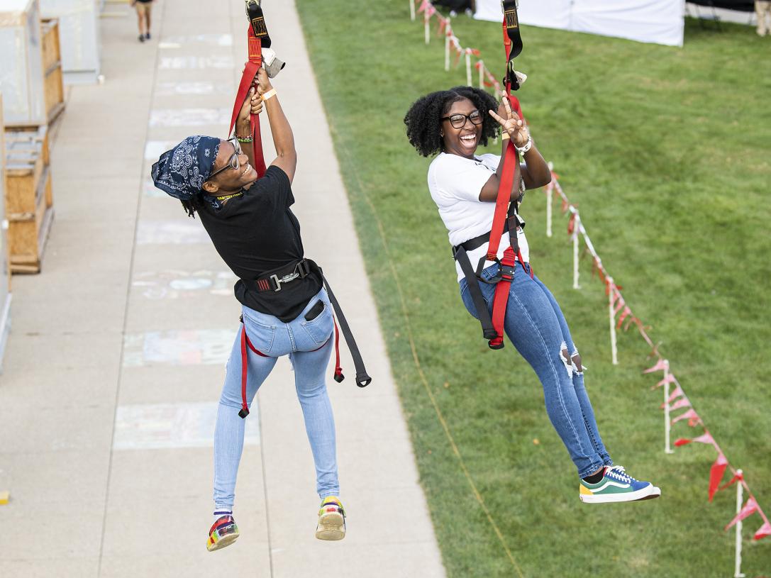 And the race is on for two PFW students ziplining at the annual Picnic on the Lawn on Sept. 7