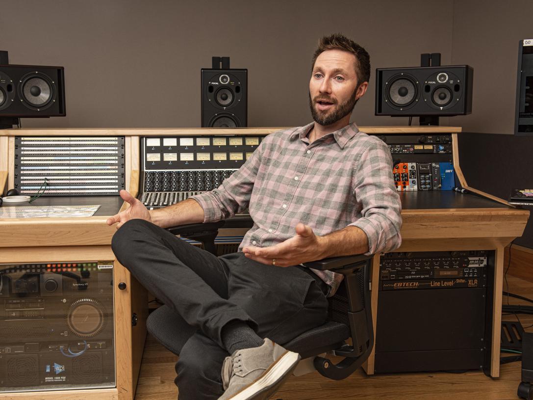 John Buteyn is sitting in a recording studio