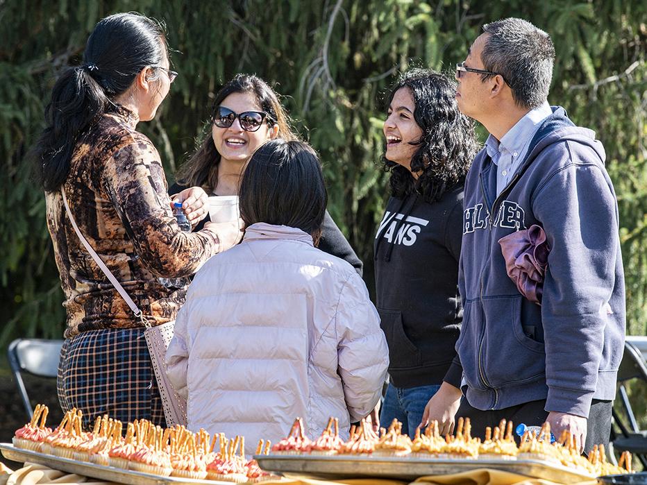 faculty and staff chat at the Mastodon Family Picnic