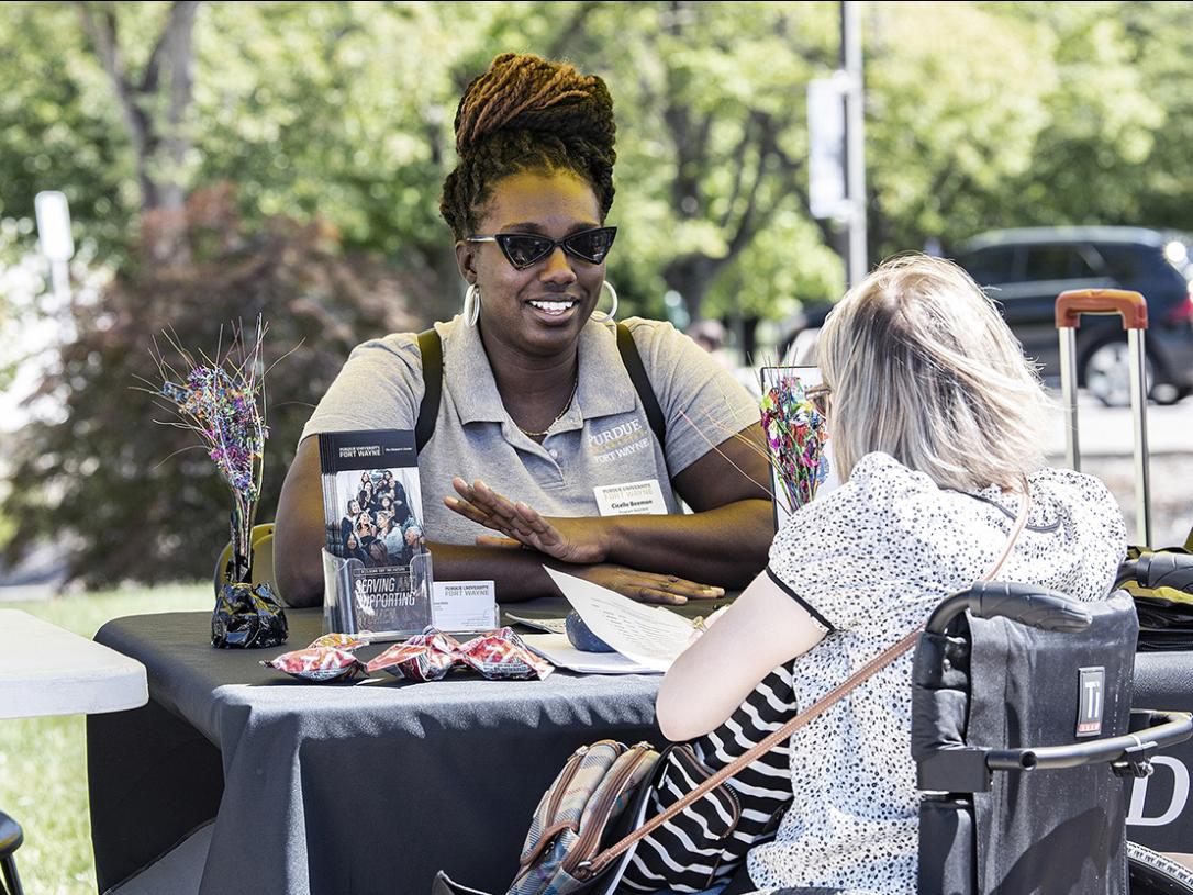 Cicelle Beemon is manning a table at the PFW Connections Fair