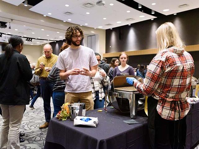 Serving up chili at the Chancellor's chili fest