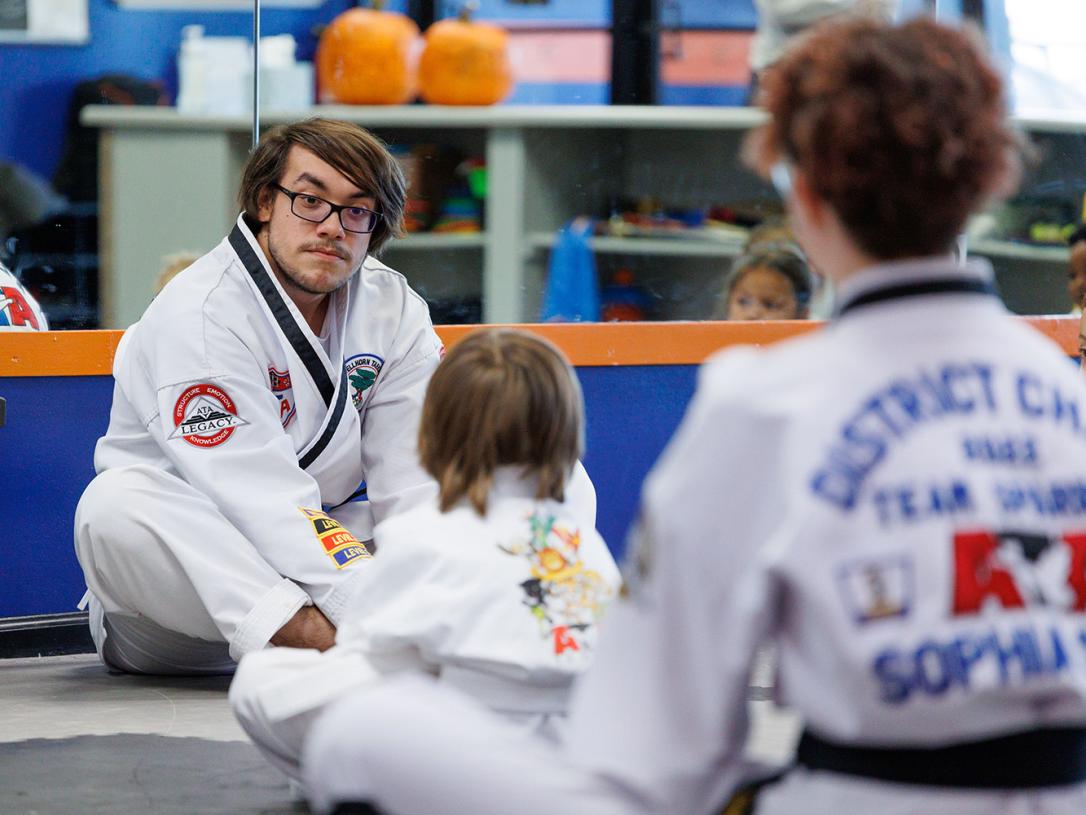 Elijah Solis teaching in a Taekwondo class