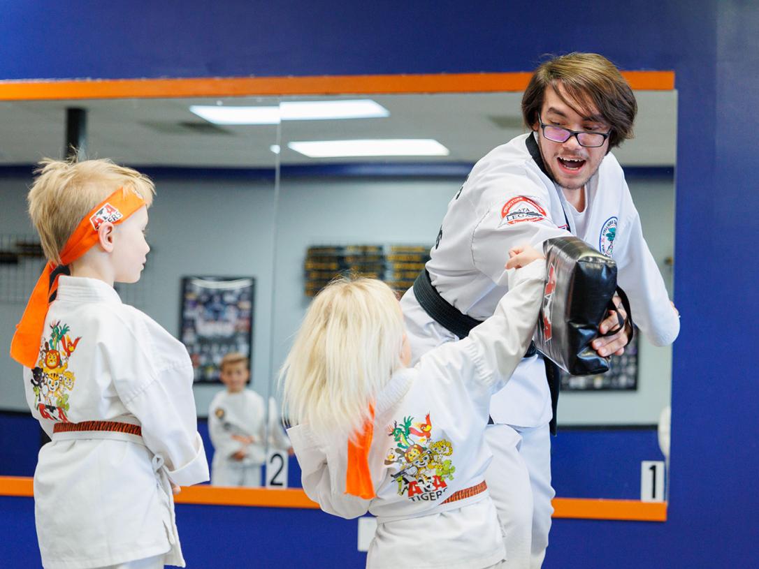 Elijah Solis teaching in a Taekwondo class